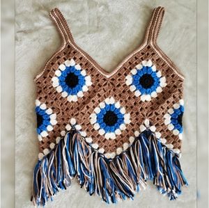 Crochet crop tank‎ top.